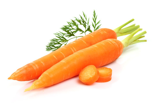 Ripe carrot with leaves