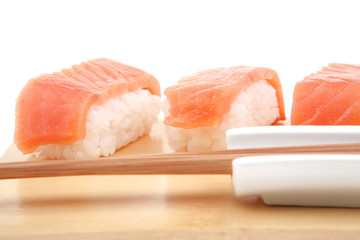 Nigiri sushi topped with raw Salmon