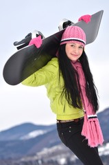 Fototapeta na wymiar femme avec planche à neige