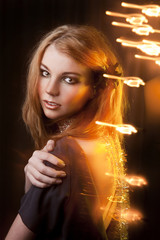 Studio portrait of beautiful girl.bright lights.