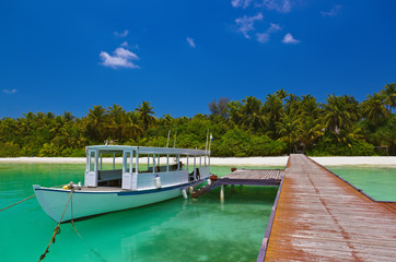Tropical island and boat