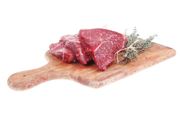 meat fillet with peppercorn and thyme ready to grill