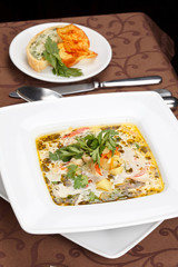 fish soup with potato chips and fish pie
