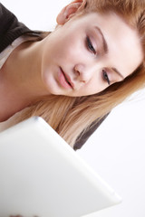 Obraz premium woman holding a touchpad pc