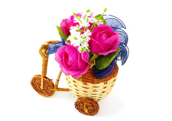 Fototapeta na wymiar Decorative bicycle vase with flowers