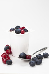 yogurt in plastic box container over white background
