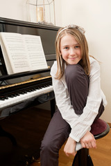 Young girl and her piano