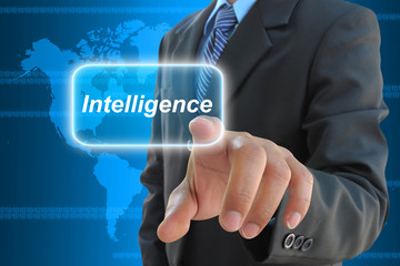 businessman hand pressing intelligence button