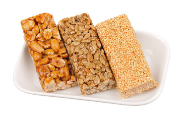 Honey bars with peanuts, sesame and sunflower seeds