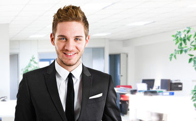 Handsome businessman in his office