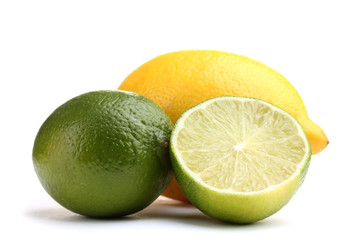 Fresh lime and lemon isolated on white