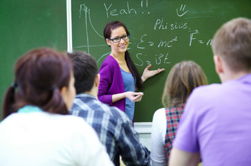 teacher  with  group of students in classroom