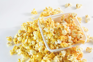 pop corn in caramel syrup in the box