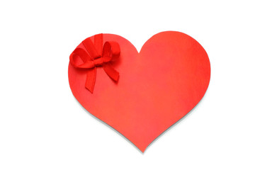 Heart with red bow on white background