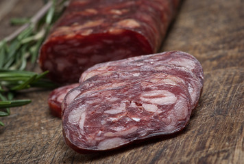 salami on wooden background