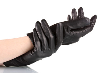 women's hands in black leather gloves isolated on white
