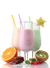 Milk shakes with fruits isolated on white