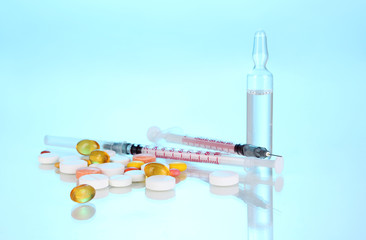Insulin syringes with medical ampoules and tablets