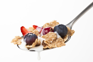 cereals bowl with red fruits isolated on white © ampFotoStudio.com