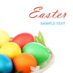 Fototapeta na wymiar Easter colored eggs in the basket