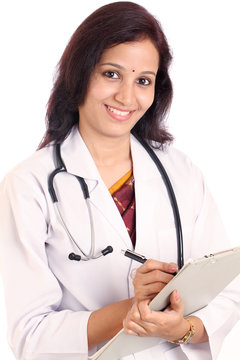 Young Indian Female Doctor holding a clipboard