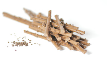 Chocolate sticks with chocolate granules isolated