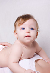 Cute baby girl with blue eyes