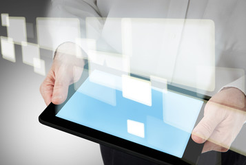 business man hold a modern tablet pc