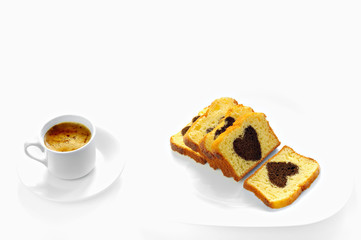 cake with cocoa heart inside and a cup of coffee