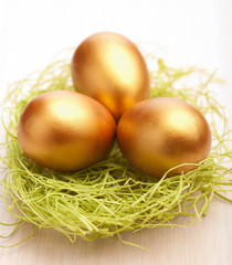 Naklejka na ściany i meble golden easter eggs