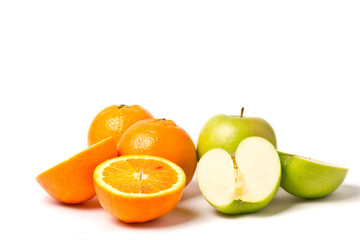 Fototapeta na wymiar apples and oranges isolated on white