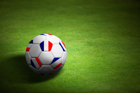 Flag of France with soccer ball over grass - Euro 2012