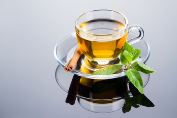 Tea cup with fresh mint leaves