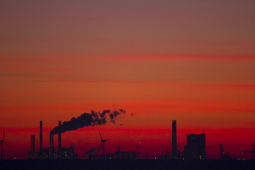 Fototapeta na wymiar Industrial scenery at sunset, Rotterdam, The Netherlands