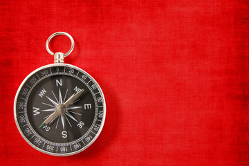 compass on the vivid red background