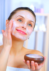Beautiful Woman Applying Natural Homemade Facial Mask