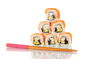 Tasty rolls with chopsticks isolated on white