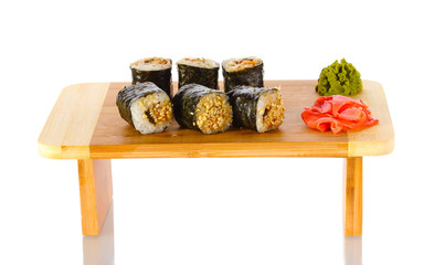 Tasty rolls served on wooden plate isolated on white