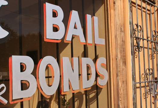 Bail Bonds Sign in Window of Business