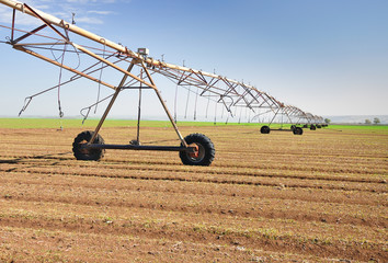 Mobile irrigation system in the field on Golan Heights. Israel.