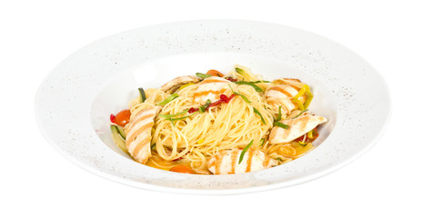 close-up of plate of pasta and chicken