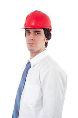 Portrait of engineer wearing shirt, tie and red helmet