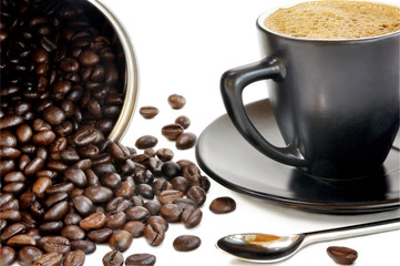Coffee beans and black cup