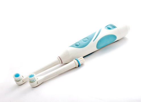 electric toothbrush on white background