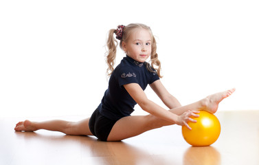 young girl doing gymnastics over white background