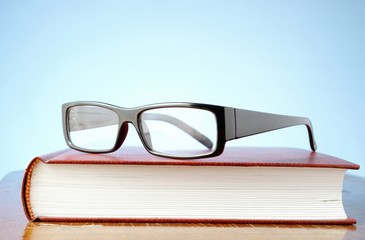 glasses and a book