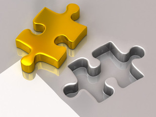 Gold jigsaw puzzle piece