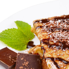 Crepes with chocolate sauce