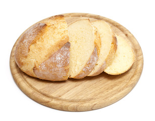 freshly baked bread on wooden cutting board