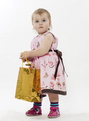The little girl with the  bag